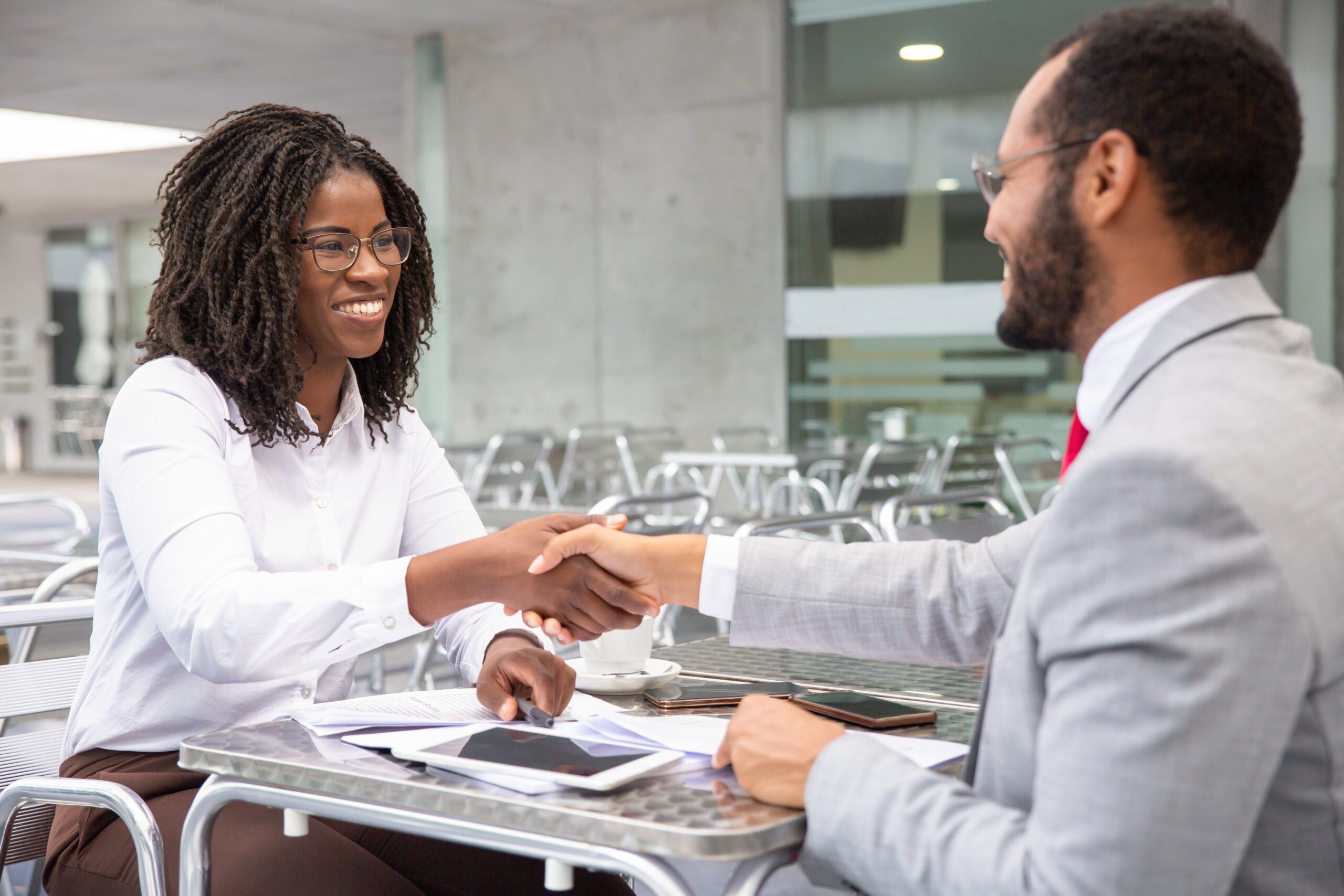 https://midaslg.com/wp-content/uploads/2025/07/cheerful-businesspeople-reaching-agreement-1-scaled.jpg
